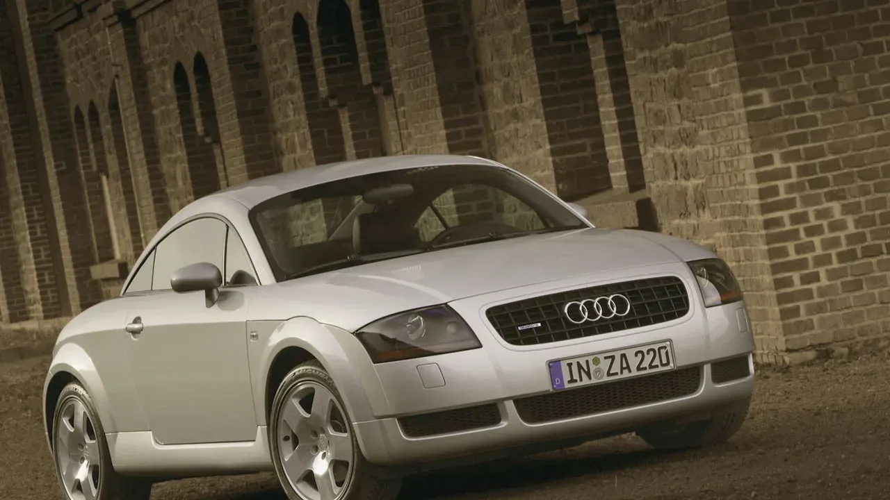 Silver first-generation Audi TT viewed from the front three-quarter angle