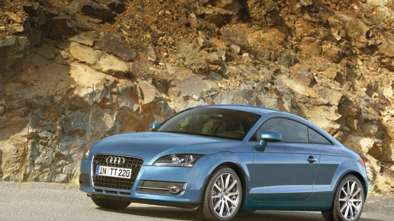 Blue second-generation Audi TT viewed from the front three-quarter angle